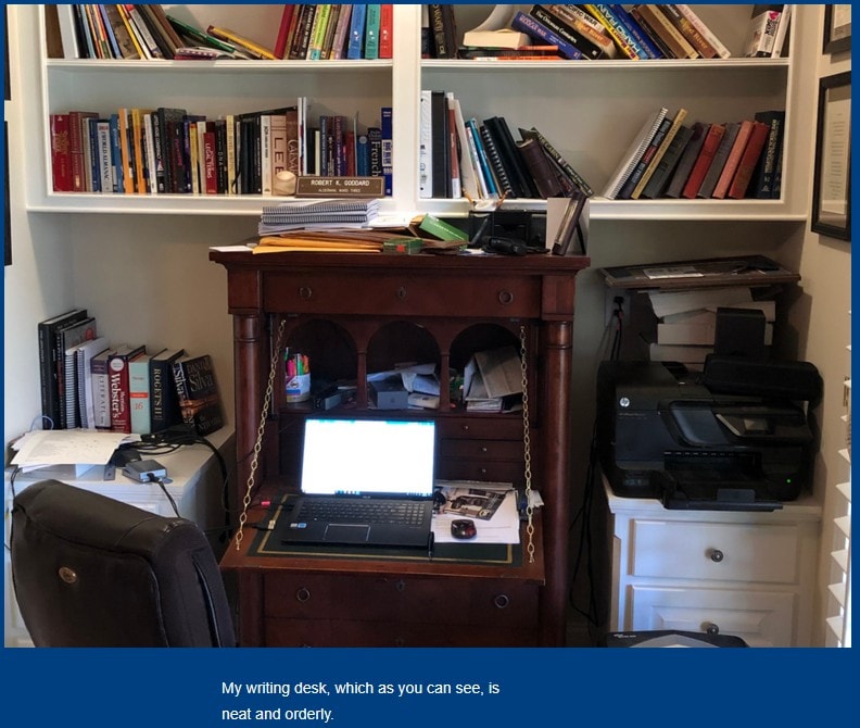Robert Goddard's writing desk surrounded by bookshelves